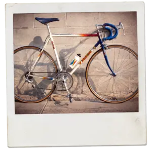 Polaroid photo of an old bicycle